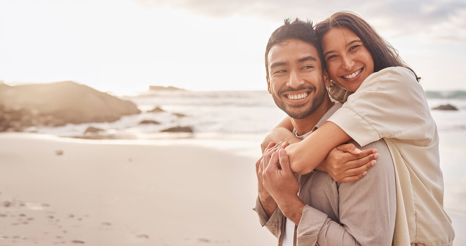 smiling couple on the beach